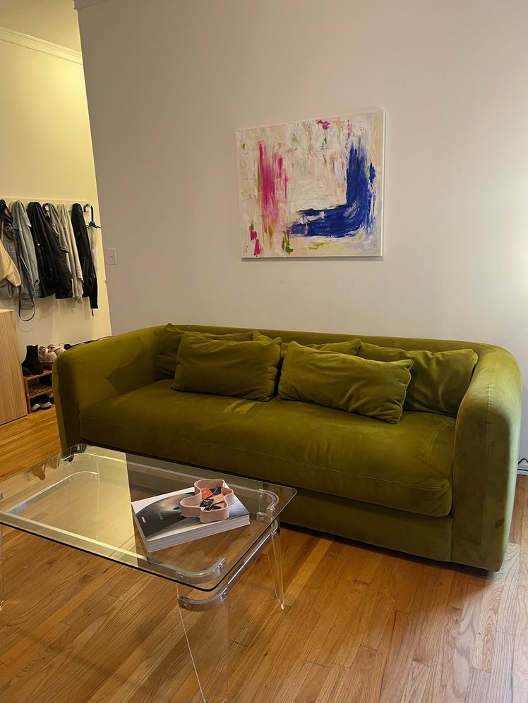 Image may contain: Couch, Furniture, Indoors, Interior Design, Table, Home Decor, Architecture, Building, and Living Room