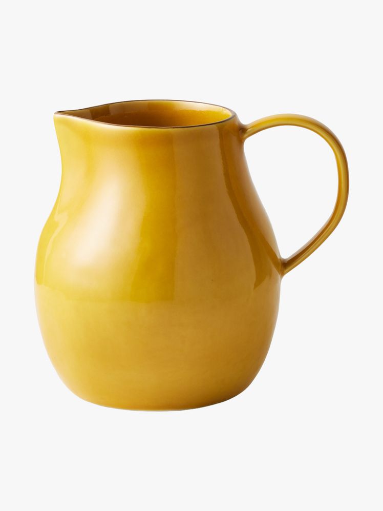 Yellow ceramic pitcher.