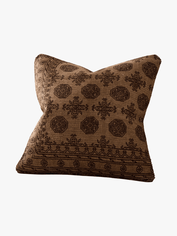 A sleek dark brown wooden bench with a minimalist design. It has a smooth elongated surface and sturdy legs