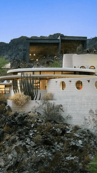 Image may contain Architecture Building Outdoors Shelter Bunker Nature and Plant