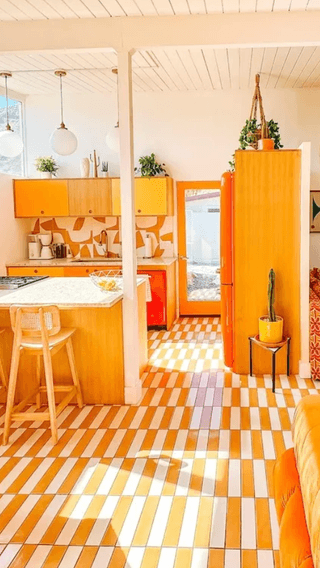 Image may contain Indoors Interior Design Floor Home Decor Kitchen Flooring Wood and Furniture