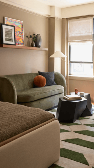 Image may contain Home Decor Couch Furniture Architecture Building Indoors Living Room Room and Interior Design